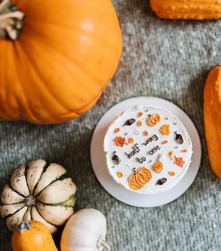 Autumn bento cake among pumpkins