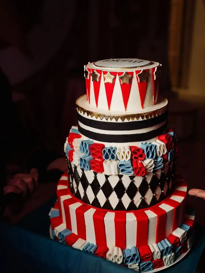 Circus-themed corporate tiered cake
